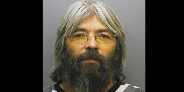 This Jan. 2006 file photo provided by the Larimer County, Colo. Sheriff's Office shows Gary Brooks Faulkner, after he was arrested on a Compulsory Insurance charge.