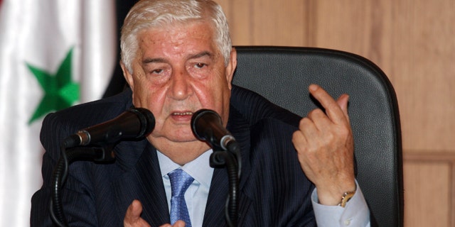 June 22: Syrian Foreign Minister Walid Moallem speaks during a news conference in Damascus, Syria.