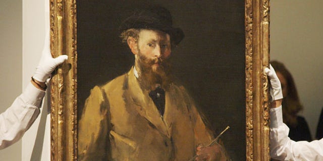 June 22: View of French Impressionist Edouard Manet's 'Self Portrait,' which sold at auction at Sotheby's in London for $33 million.
