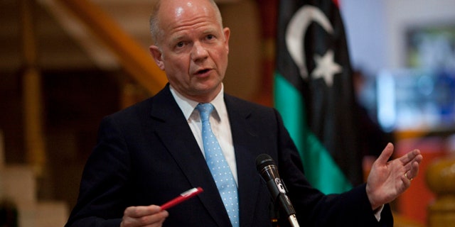 May 4: British Foreign Secretary William Hague gestures during a press conference in the rebel stronghold of Benghazi, Libya.