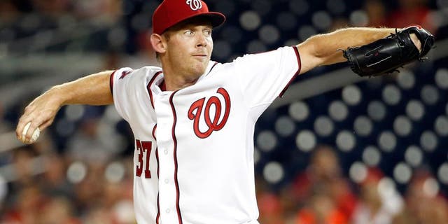 Washington Nationals starting pitcher Stephen Strasburg (37) throws during the third inning of a baseball game against the Atlanta Braves at Nationals Park, Tuesday, June 23, 2015, in Washington. (AP Photo/Alex Brandon)