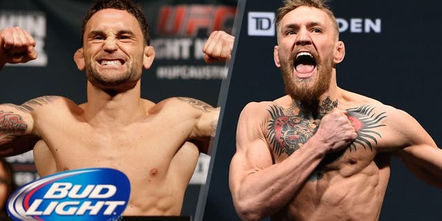 Frankie Edgar poses on the scale after weighing in during the UFC weigh-in at The Frank Erwin Center on November 21, 2014 in Austin, Texas. (Photo by Josh Hedges/Zuffa LLC/Zuffa LLC via Getty Images) Conor 'The Notorious' McGregor of Ireland steps on the scale during the UFC Fight Night Boston weigh-in event at the Orpheum Theatre on January 17, 2015 in Boston, Massachusetts. (Photo by Jeff Bottari/Zuffa LLC/Zuffa LLC via Getty Images)