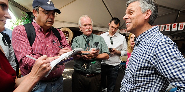 June 24: Former Utah Gov. Jon Huntsman talks to the media during a campaign stop at the Reno Rodeo in Reno, Nev.