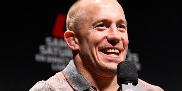 MONTREAL, QC - APRIL 24: Former UFC welterweight champion Georges St-Pierre interacts with fans during a Q&A session before the UFC 186 weigh-in event at Metropolis on April 24, 2015 in Montreal, Quebec, Canada. (Photo by Jeff Bottari/Zuffa LLC/Zuffa LLC via Getty Images)