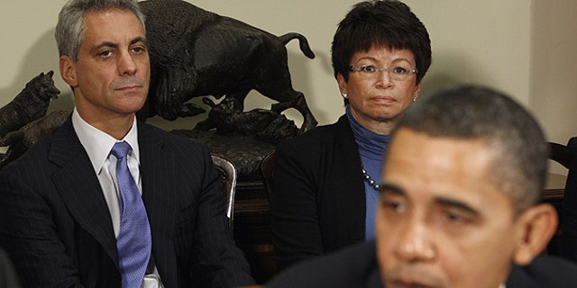 President Obama is joined by Chief of Staff Rahm Emanuel, left, and White House Senior Advisor Valerie Jarrett during a speech at the White House.