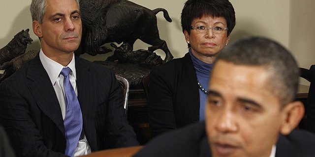 President Obama is joined by Chief of Staff Rahm Emanuel, left, and White House Senior Advisor Valerie Jarrett during a speech at the White House.