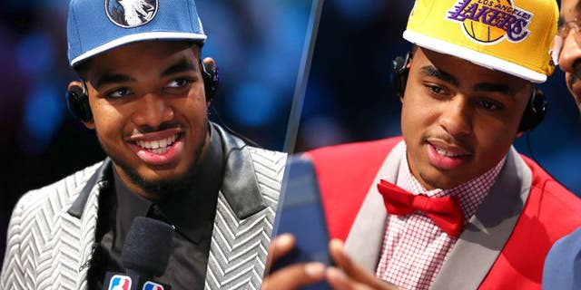 NEW YORK, NY - JUNE 25: Karl-Anthony Towns speaks to the media after being drafted first overall by the Minnesota Timberwolves in the First Round of the 2015 NBA Draft at the Barclays Center on June 25, 2015 in the Brooklyn borough of New York City. NOTE TO USER: User expressly acknowledges and agrees that, by downloading and or using this photograph, User is consenting to the terms and conditions of the Getty Images License Agreement. (Photo by Elsa/Getty Images) NEW YORK, NY - JUNE 25: D'Angelo Russell speaks to the media after being drafted second overall by the Los Angeles Lakers in the First Round of the 2015 NBA Draft at the Barclays Center on June 25, 2015 in the Brooklyn borough of New York City. NOTE TO USER: User expressly acknowledges and agrees that, by downloading and or using this photograph, User is consenting to the terms and conditions of the Getty Images License Agreement. (Photo by Elsa/Getty Images)