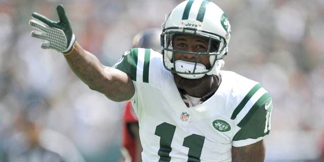 Sep 8, 2013; East Rutherford, NJ, USA; New York Jets wide receiver Jeremy Kerley (11) celebrates a first down against the Tampa Bay Buccaneers during the first half at MetLife Stadium. Mandatory Credit: Joe Camporeale-USA TODAY Sports