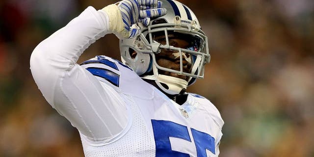 PHILADELPHIA, PA - DECEMBER 14: Rolando McClain #55 of the Dallas Cowboys reacts during the game against the Philadelphia Eagles at Lincoln Financial Field on December 14, 2014 in Philadelphia, Pennsylvania. (Photo by Elsa/Getty Images)