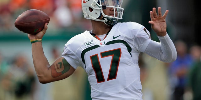 Miami quarterback Stephen Morris (17) fires a pass against South Florida during the second quarter of an NCAA college football game Saturday, Sept. 28, 2013, in Tampa, Fla. (AP Photo/Chris O'Meara)