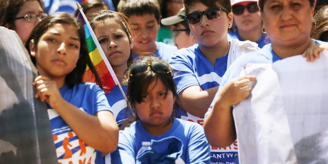 United We Dream activists participate in a rally in front of the White House July 28, 2014 in Washington, DC.