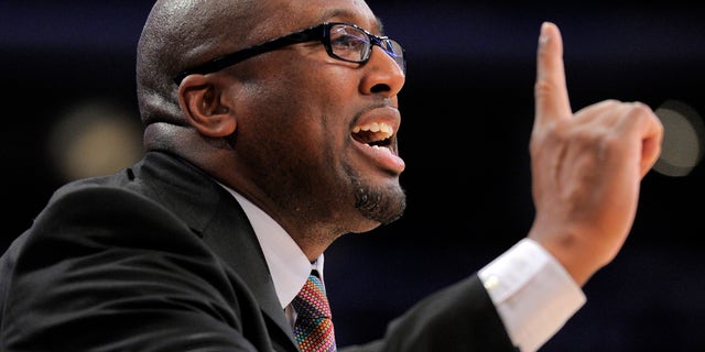 FILE - In this Dec. 25, 2011 file photo, Los Angeles Lakers coach Mike Brown gestures during the second half of the Lakers' NBA basketball game against the Chicago Bulls, in Los Angeles. The Cavaliers intend to speak with former coach Brown about returning to the team. Brown was fired by Cleveland three years ago and replaced by Byron Scott, who was let go by the Cavs on Thursday after he went 64-166 in three seasons _ one of the worst stretches in team history. . (AP Photo/Mark J. Terrill, File)