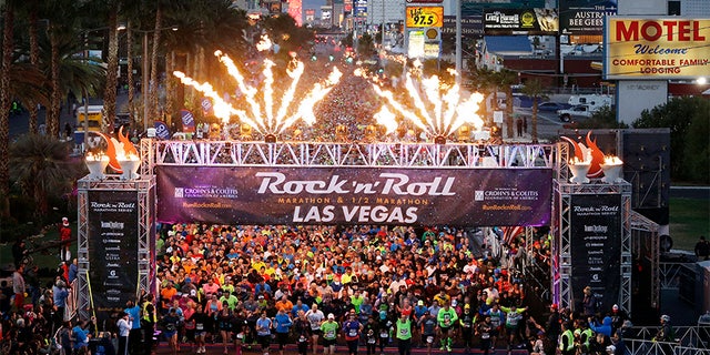In this Nov. 16, 2014, file photo, runners begin the Rock 'n' Roll Las Vegas Marathon along the Las Vegas Strip in Las Vegas.