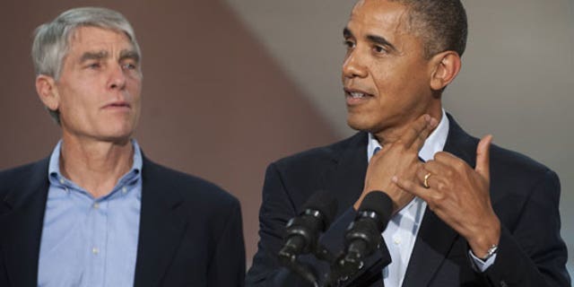 Udall and Obama. By Saul Loeb, AFP/Getty Images.