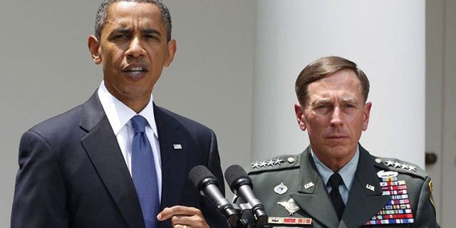 June 23: President Obama announces that Gen. David Petraeus, right, will replace Gen. Stanley McChrystal as his top commander in Afghanistan while in the Rose Garden of the White House in Washington (Reuters).