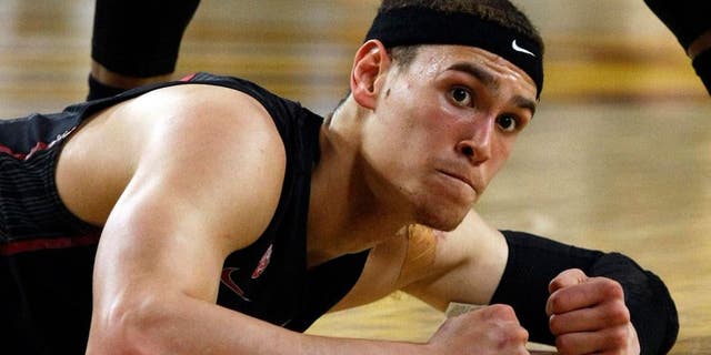 Feb 26, 2014; Tempe, AZ, USA; Stanford Cardinal forward Dwight Powell (33) reacts after getting fouled and knocked to the ground against the Stanford Cardinal during the first half at Wells Fargo Arena. Mandatory Credit: Rick Scuteri-USA TODAY Sports