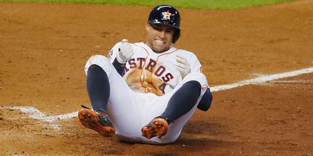 HOUSTON, TX - JULY 01: George Springer #4 of the Houston Astros gets hit by a pitch in the fifth inning during their game against the Kansas City Royals at Minute Maid Park on July 1, 2015 in Houston, Texas. (Photo by Scott Halleran/Getty Images)
