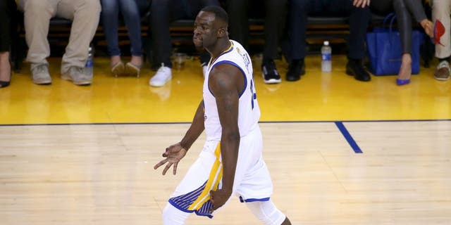 Jun 14, 2015; Oakland, CA, USA; Golden State Warriors forward Draymond Green (23) reacts after a three pointer during the first quarter against the Cleveland Cavaliers in game five of the NBA Finals at Oracle Arena. Mandatory Credit: Kelley L Cox-USA TODAY Sports