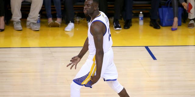 Jun 14, 2015; Oakland, CA, USA; Golden State Warriors forward Draymond Green (23) reacts after a three pointer during the first quarter against the Cleveland Cavaliers in game five of the NBA Finals at Oracle Arena. Mandatory Credit: Kelley L Cox-USA TODAY Sports