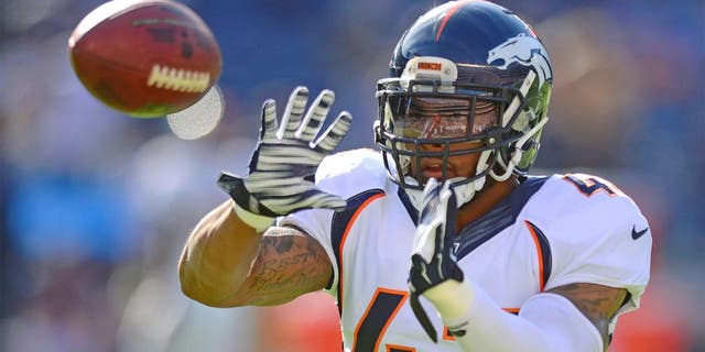 Dec 14, 2014; San Diego, CA, USA; Denver Broncos strong safety T.J. Ward (43) catches a pass before the game against the San Diego Chargers at Qualcomm Stadium. Mandatory Credit: Jake Roth-USA TODAY Sports