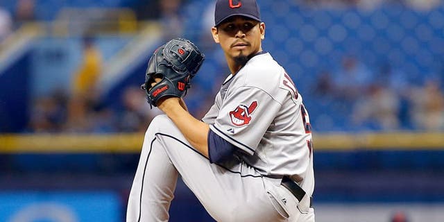 Carlos Carrasco #59 of the Cleveland Indians pitches during the first inning of a game against the Tampa Bay Rays on July 1, 2015 at Tropicana Field in St. Petersburg, Florida. (Photo by Brian Blanco/Getty Images)