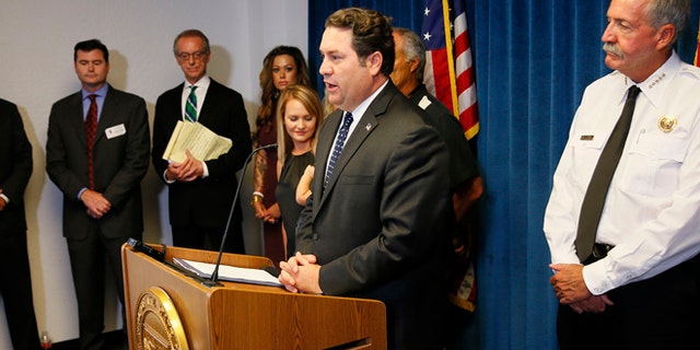 June 29, 2015: Arizona Attorney General Mark Brnovich discusses the status of the Yarnell Hill Fire settlement negotiations at the Arizona Attorney General's office in Phoenix.