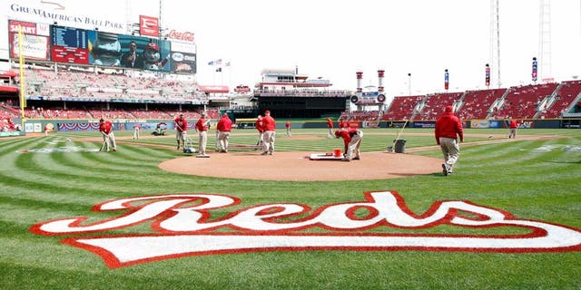 Mar 31, 2014; Cincinnati, OH, USA; A general view of the Cincinnati Reds grounds keepers preparing the field prior to the game against the St. Louis Cardinals at Great American Ball Park. Mandatory Credit: Frank Victores-USA TODAY Sports