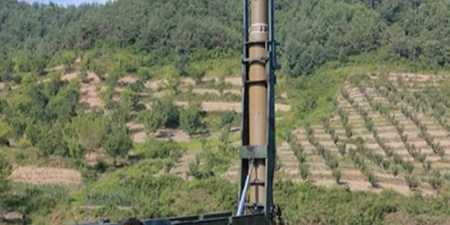 This image made from video of a news bulletin aired by North Korea's KRT on Tuesday, July 4, 2017, shows what was said to be the preparation of the launch of a Hwasong-14 intercontinental ballistic missile, ICBM, in North Korea's northwest.