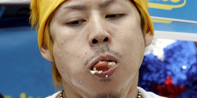 Six-Time Hot Dog-Eating Contest Winner Takeru Kobayashi is seen in this July 4, 2006 file photo.