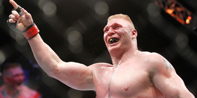 July 3: Brock Lesnar celebrates his second round victory over Shane Carwin during their UFC heavyweight mixed martial arts title match at The MGM Grand Garden Arena in Las Vegas.