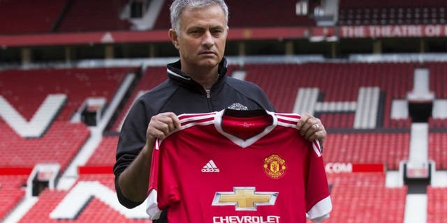 MANCHESTER, UNITED KINGDOM - JULY 5: Manchester United's new manager Jose Mourinho poses for pictures during a photocall at the club's Old Trafford Stadium on July 5, 2016 in Manchester, England. (Photo by Jon Super/Anadolu Agency/Getty Images)