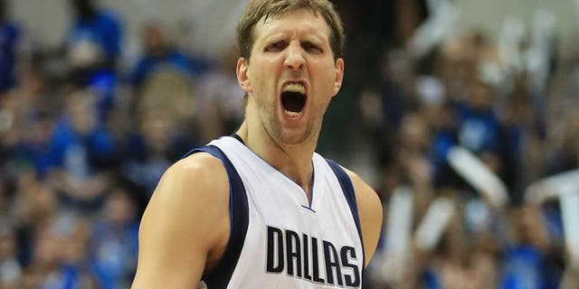 DALLAS, TX - APRIL 21: Dirk Nowitzki #41 of the Dallas Mavericks reacts against the Oklahoma City Thunder during game three of the Western Conference Quarterfinals of the 2016 NBA Playoffs at American Airlines Center on April 21, 2016 in Dallas, Texas. NOTE TO USER: User expressly acknowledges and agrees that, by downloading and or using this photograph, User is consenting to the terms and conditions of the Getty Images License Agreement. (Photo by Ronald Martinez/Getty Images)