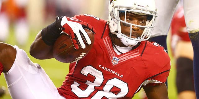 Oct 17, 2013; Phoenix, AZ, USA; Arizona Cardinals running back Andre Ellington (38) against the Seattle Seahawks at University of Phoenix Stadium. Mandatory Credit: Mark J. Rebilas-USA TODAY Sports