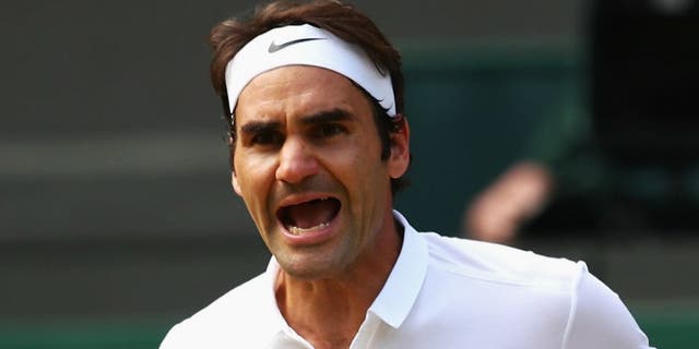 LONDON, ENGLAND - JULY 06: Roger Federer of Switzerland celebrates during the Men's Singles Quarter Finals match against Marin Cilic of Croatia on day nine of the Wimbledon Lawn Tennis Championships at the All England Lawn Tennis and Croquet Club on July 6, 2016 in London, England. (Photo by Clive Brunskill/Getty Images)