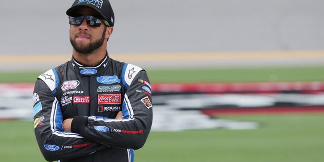 DAYTONA BEACH, FL - JULY 01: Darrell Wallace Jr., driver of the #6 LoudMouth Exhaust Ford, stands on the grid during qualifying for the NASCAR XFINITY Series Subway Firecracker 250 at Daytona International Speedway on July 1, 2016 in Daytona Beach, Florida. (Photo by Jerry Markland/Getty Images)