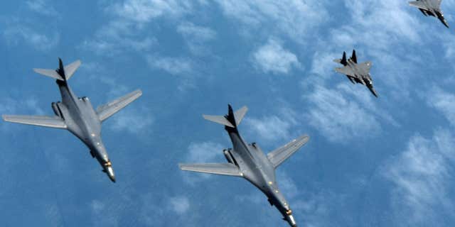 Two U.S. Air Force B-1B Lancers assigned to the 9th Expeditionary Bomb Squadron fly a 10-hour mission from Andersen Air Force Base, Guam, with two South Korean air force F-15s in the vicinity of the Korean peninsula.