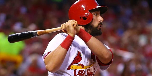 ST. LOUIS, MO - JULY 1: Matt Carpenter #13 of the St. Louis Cardinals hits an RBI single against the Milwaukee Brewers in the fourth inning at Busch Stadium on July 1, 2016 in St. Louis, Missouri. (Photo by Dilip Vishwanat/Getty Images)