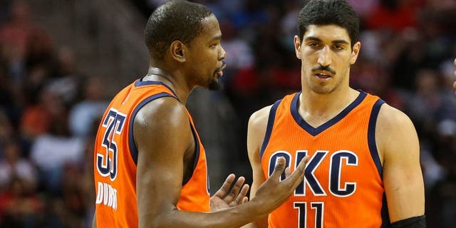 Apr 3, 2016; Houston, TX, USA; Oklahoma City Thunder forward Kevin Durant (35) talks with center Enes Kanter (11) and guard Randy Foye (6) during the second half against the Houston Rockets at Toyota Center. The Rockets won 118-110. Mandatory Credit: Troy Taormina-USA TODAY Sports