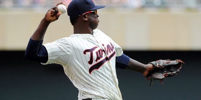 Jul 8, 2015; Minneapolis, MN, USA; Minnesota Twins third baseman Miguel Sano (22) warms up prior to the ninth inning against the Baltimore Orioles at Target Field. The Twins win 5-3 over the Orioles. Mandatory Credit: Marilyn Indahl-USA TODAY Sports