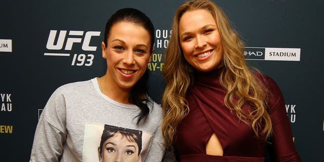NEW YORK, NY - OCTOBER 06: (R-L) UFC women's bantamweight champion Ronda Rousey and UFC women's strawweight champion Joanna Jedrzejczyk pose for a photo at the London NYC hotel ahead of UFC 193 on October 6, 2015 in New York, United States. (Photo by Mike Stobe/Zuffa LLC/Zuffa LLC via Getty Images)