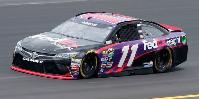 SPARTA, KY - JULY 07: Denny Hamlin, driver of the #11 FedEx Freight Toyota, practices for the NASCAR Sprint Cup Series Quaker State 400 at Kentucky Speedway on July 7, 2016 in Sparta, Kentucky. (Photo by Brian Lawdermilk/NASCAR via Getty Images)