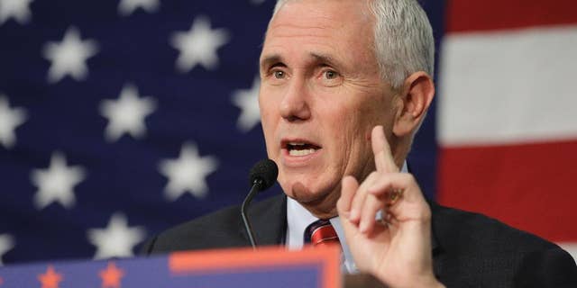 FILE -In this Sept. 30, 2016 file photo, Republican vice presidential candidate, Indiana Gov. Mike Pence speaks in Fort Wayne, Ind. Pence musters all of his Midwestern earnestness as he describes Donald Trump as “a man of faith.” He says the Republican nominee is “a man I’ve prayed with and gotten to know on a personal level.” The description, in an interview with The Associated Press, stands in sharp relief to Trump's public profile over much of his career: a twice-divorced former playboy who has boasted of his sexual exploits, flaunted his wealth, used crass insults and made sweeping generalizations about whole races. (AP Photo/Darron Cummings, File)