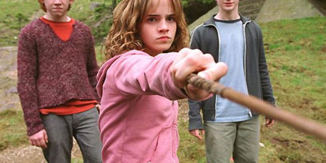 May 1, 2004: Emma Watson with co-stars Rupert Grint and Daniel Radcliffe in a scene from the movie "Harry Potter And The Prisoner Of Azkaban."