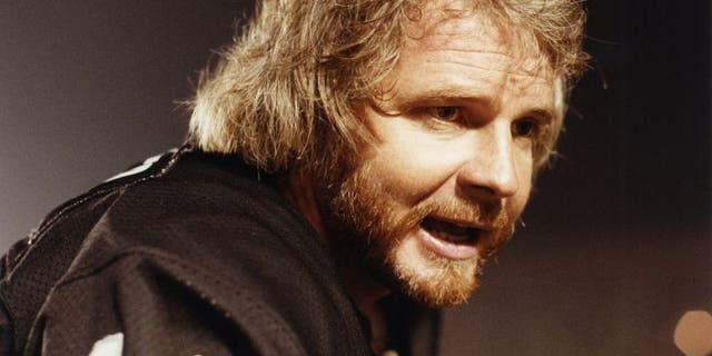 Ken Stabler #12 of the Oakland Raiders looks on during a circa 1970s game at Oakland-Alameda County Coliseum in Oakland, California.