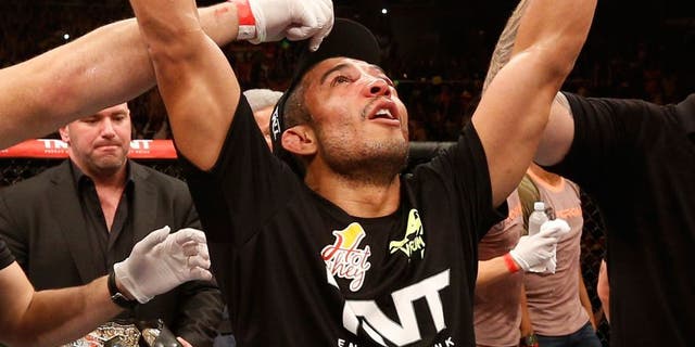 RIO DE JANEIRO, BRAZIL - OCTOBER 25: Jose Aldo of Brazil celebrates after his unanimous-decision victory over Chad Mendes in their featherweight championship bout during the UFC 179 event at Maracanazinho on October 25, 2014 in Rio de Janeiro, Brazil. (Photo by Josh Hedges/Zuffa LLC/Zuffa LLC via Getty Images)