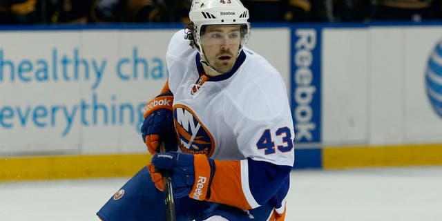 Apr 13, 2014; Buffalo, NY, USA; New York Islanders left wing Mike Halmo (43) against the Buffalo Sabres at First Niagara Center. Mandatory Credit: Timothy T. Ludwig-USA TODAY Sports