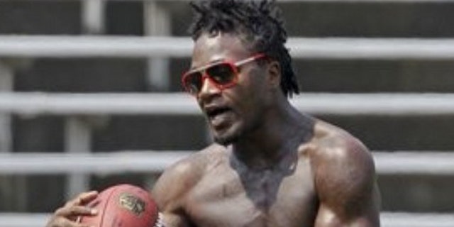 June 8: Cincinnati Bengals defensive back Adam "Pacman" Jones catches a pass during a players organized football workout in Cincinnati.