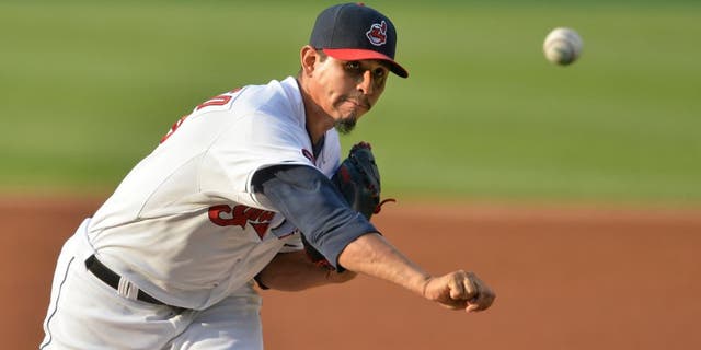Jul 6, 2015; Cleveland, OH, USA; Cleveland Indians starting pitcher Carlos Carrasco (59) delivers in the first inning against the Houston Astros at Progressive Field. Mandatory Credit: David Richard-USA TODAY Sports