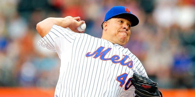 NEW YORK, NY - JULY 01: Bartolo Colon #40 of the New York Mets in action against the Chicago Cubs at Citi Field on July 1, 2015 in the Flushing neighborhood of the Queens borough of New York City. The Cubs defeated the Mets 2-0 after 11 innings. (Photo by Jim McIsaac/Getty Images)