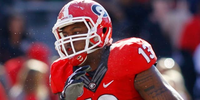 Apr 16, 2016; Athens, GA, USA; Georgia Bulldogs defensive end Jonathan Ledbetter (13) rushes the passer during the second half of the spring game at Sanford Stadium. The Black team defeated the Red team 34-14. Mandatory Credit: Brett Davis-USA TODAY Sports